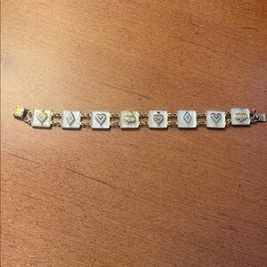 Vintage Deck of cards symbols bracelet in gold tone with mother of pearl.